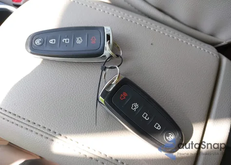 2015 Ford Escape Titanium z USA, uszkodzony, nr VIN 1FMCU0J93FUC55513